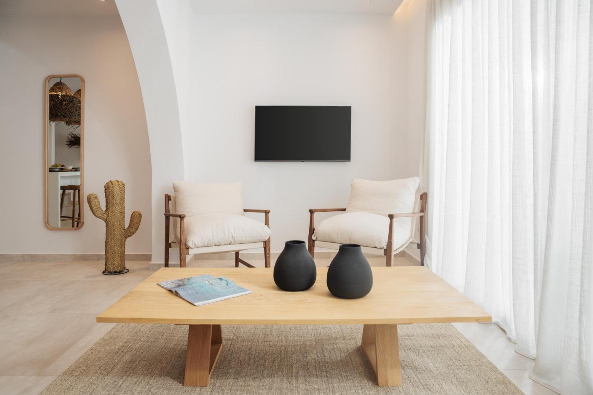 Seanfinity Beachfront Suites Mikrí Vígla Szoba fotó
