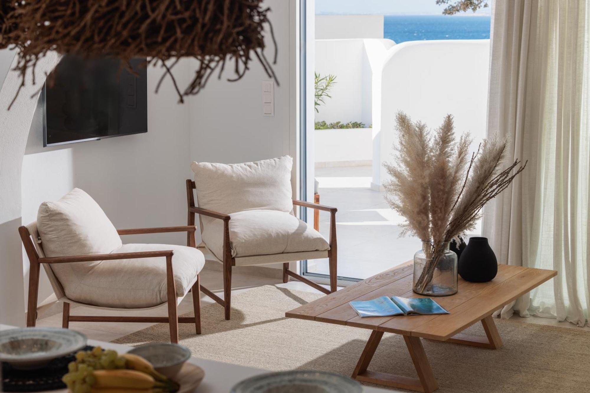 Seanfinity Beachfront Suites Mikrí Vígla Szoba fotó